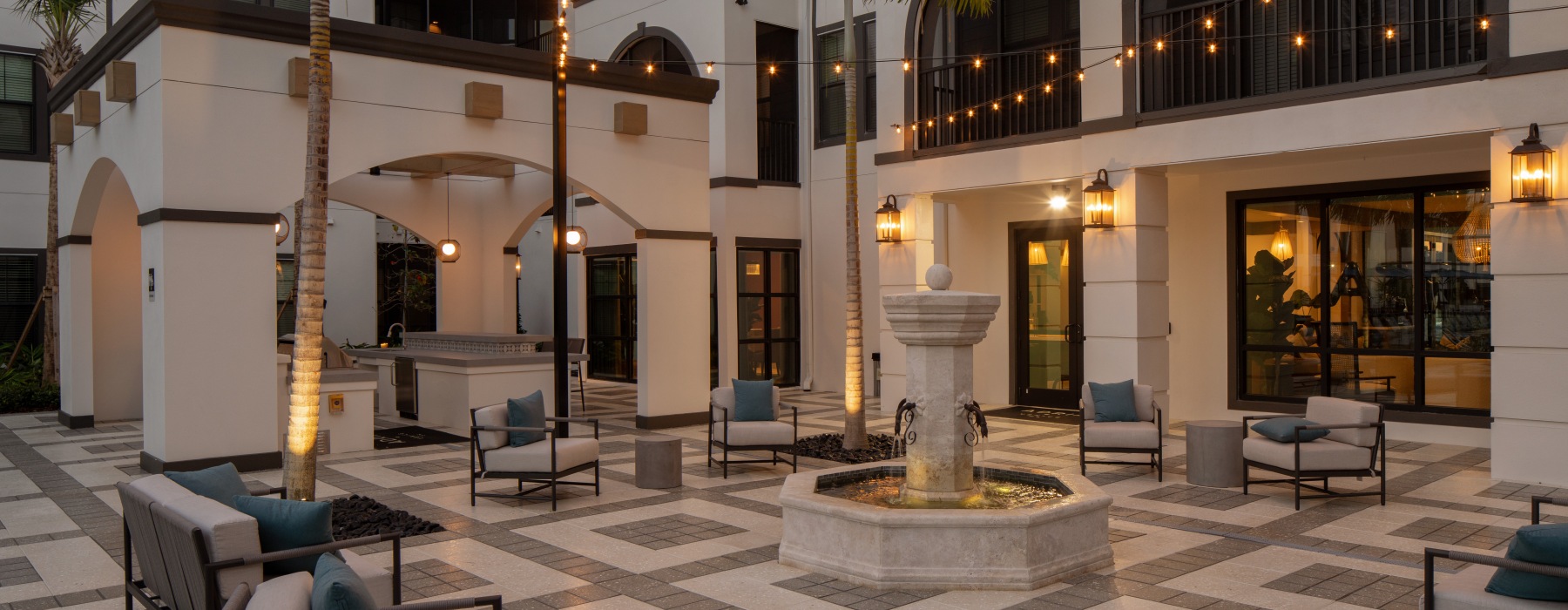 courtyard with  seating and a fountain