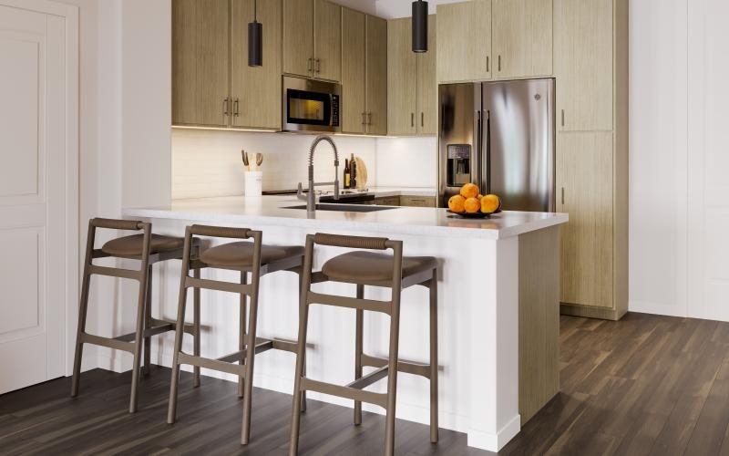 a kitchen with a wood floor